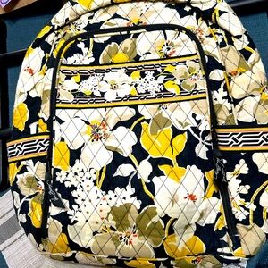 Vera Bradley Backpack, pretty floral print. Holds a lot. Straps are sturdy.